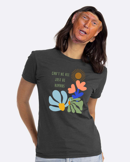 Person wearing a t-shirt with floral design and text on a plain background